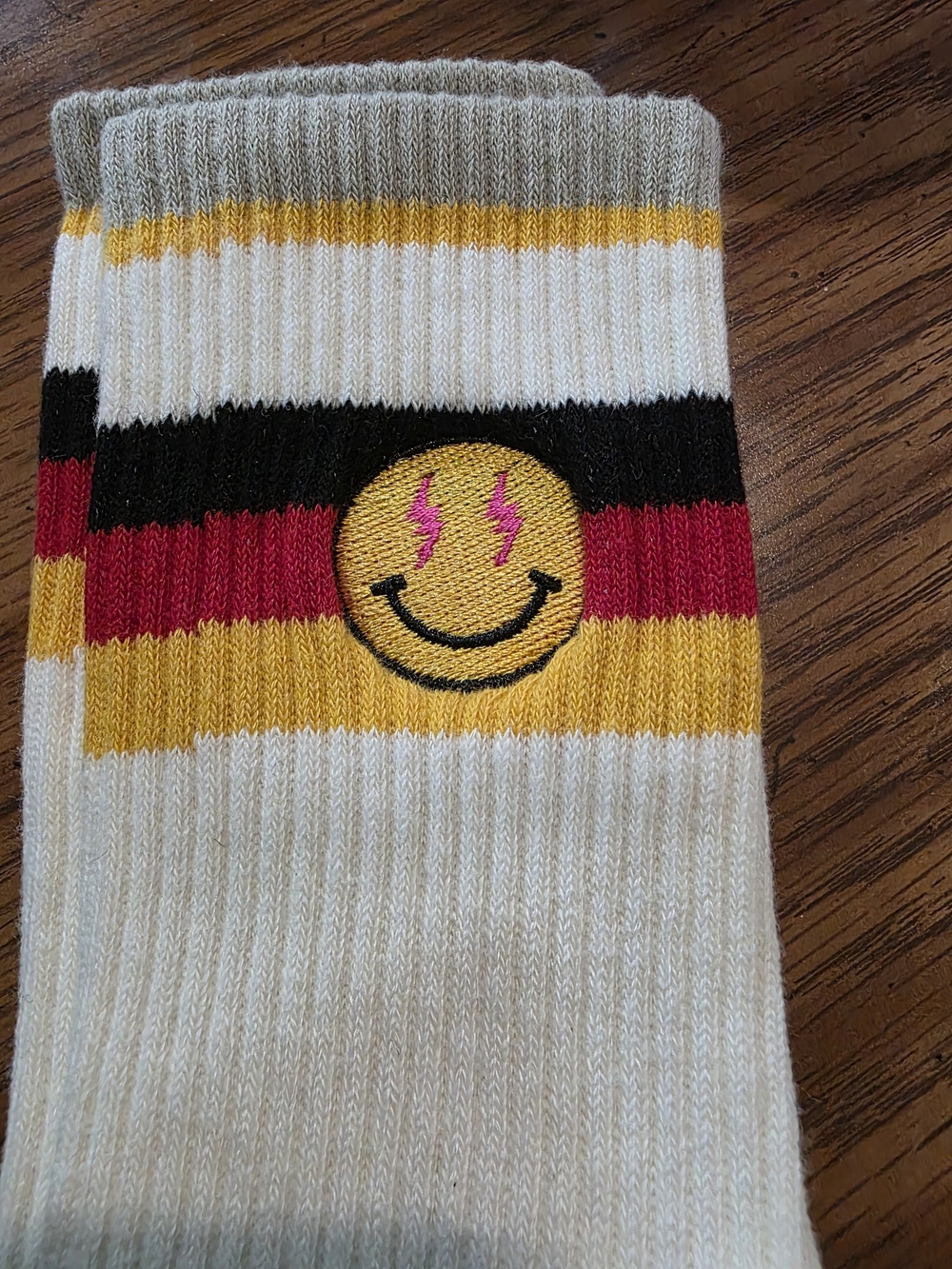 Happy Socks White Crew Socks with Yellow Smiley and Pink Lightning Eyes